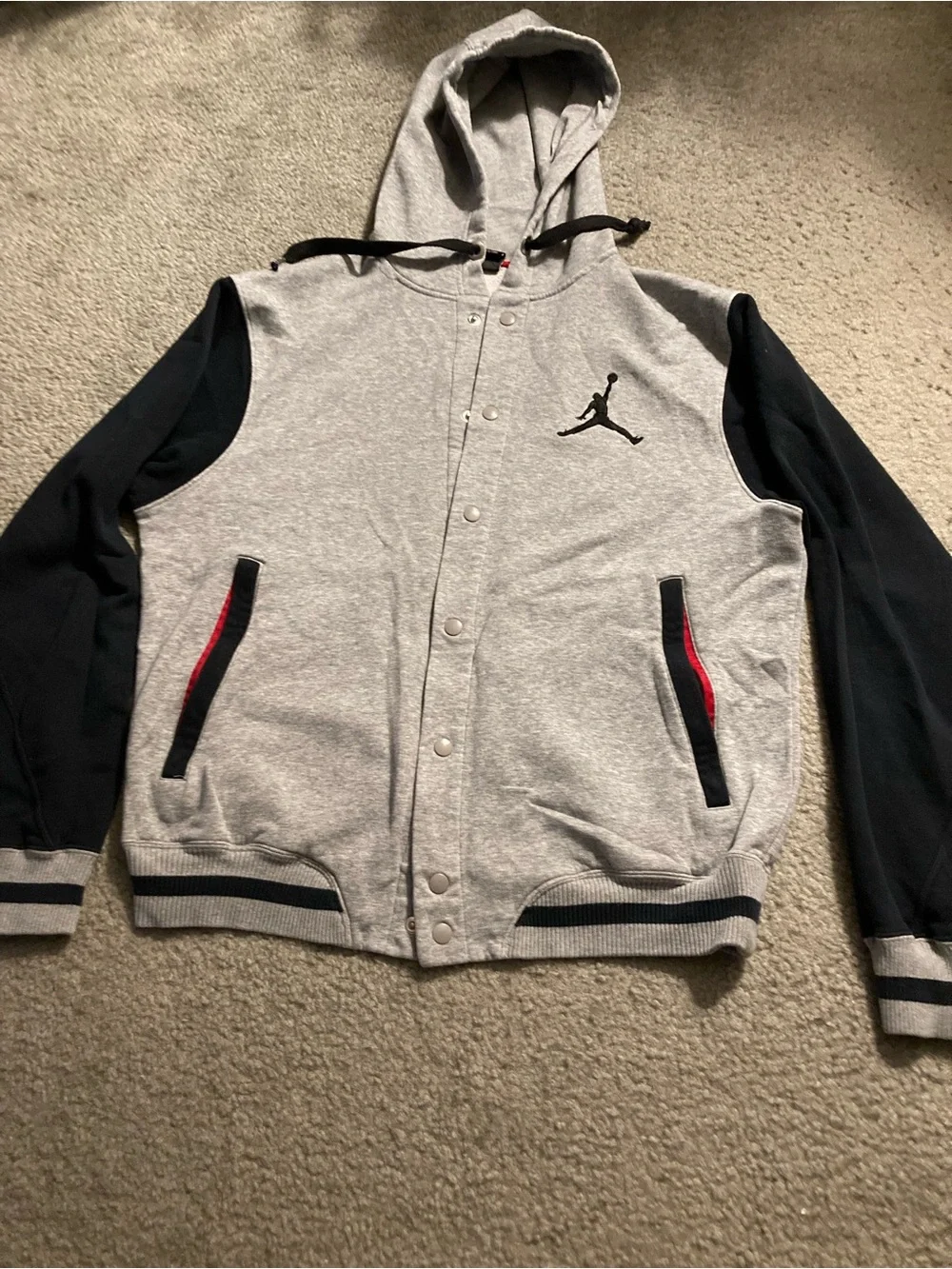 Jordan Grey and Black Hooded Varsity Jacket with Red Trim